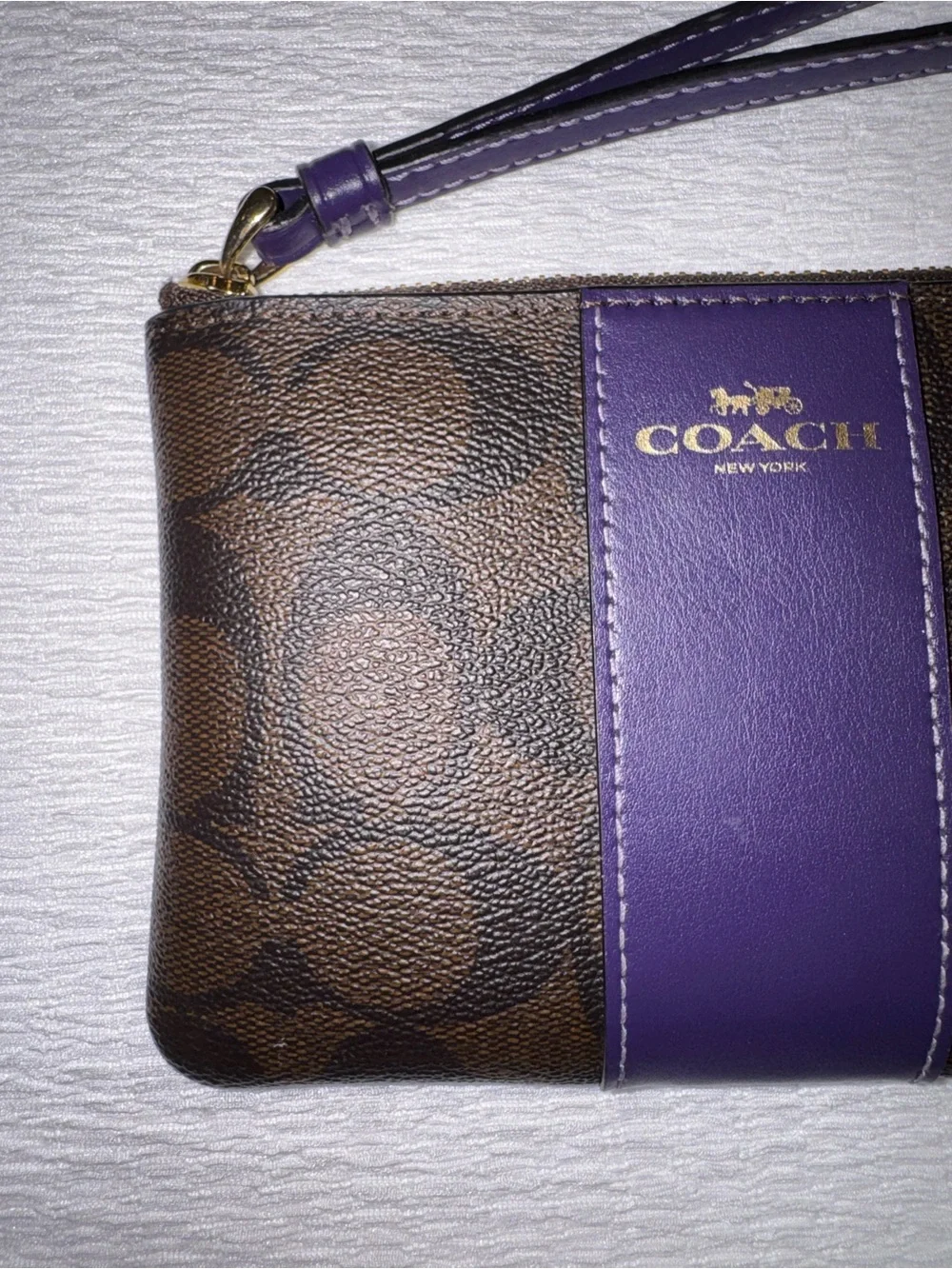 Coach Brown Signature Wristlet with Purple Center Stripe